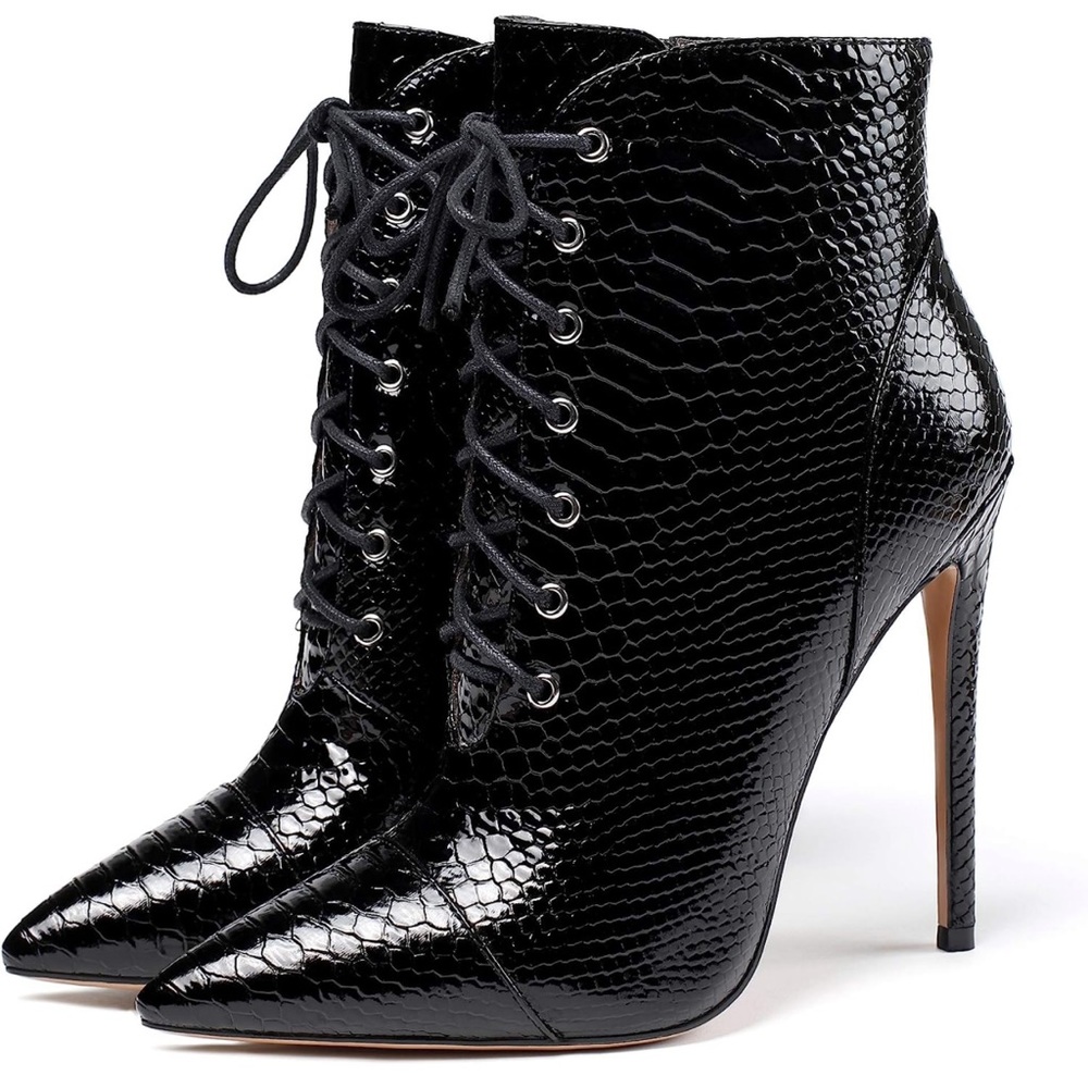 Black python pattern ankle boots. Made with microfiber. 4’7” heel. Size 11.5